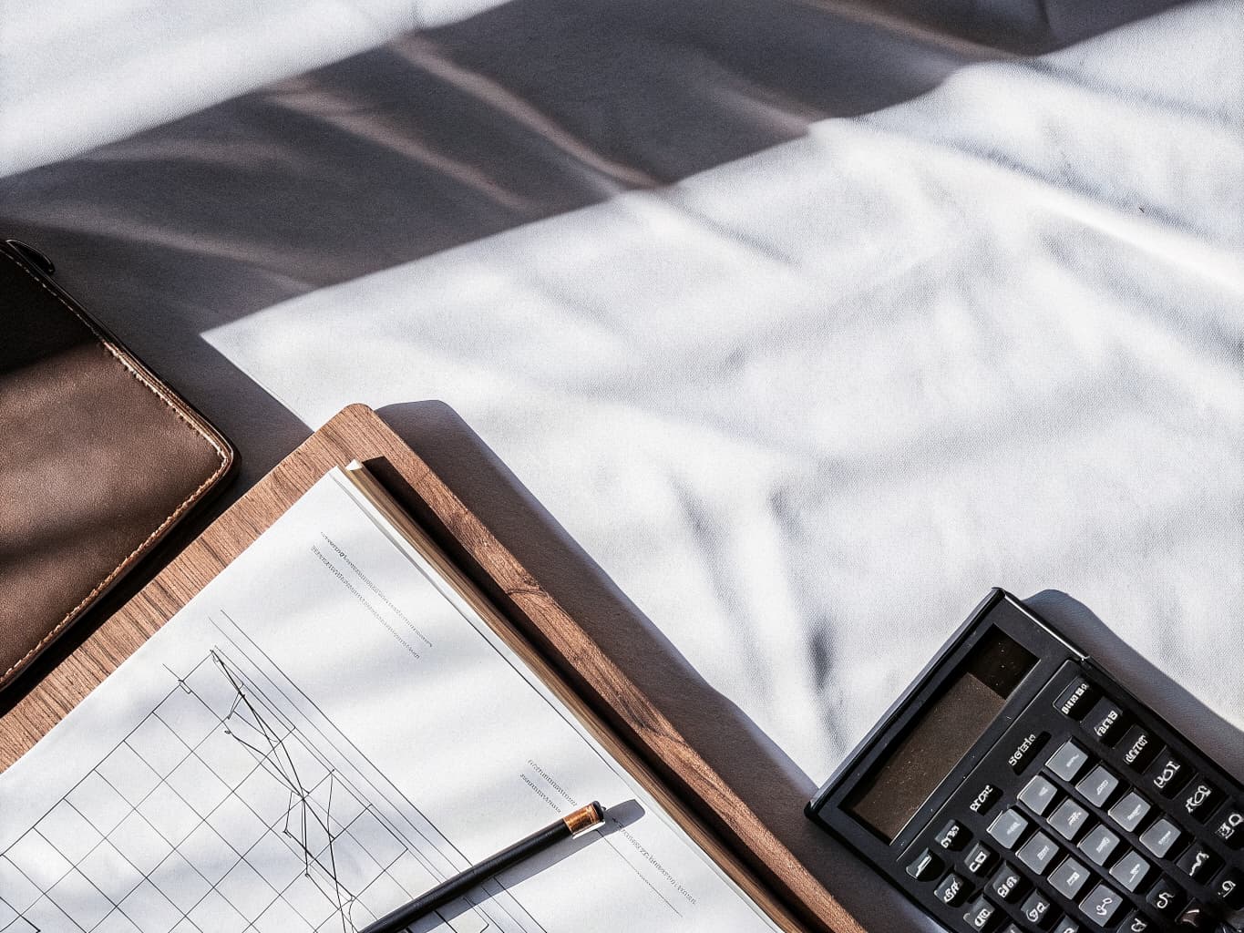 Financial charts and accounting documents on desk